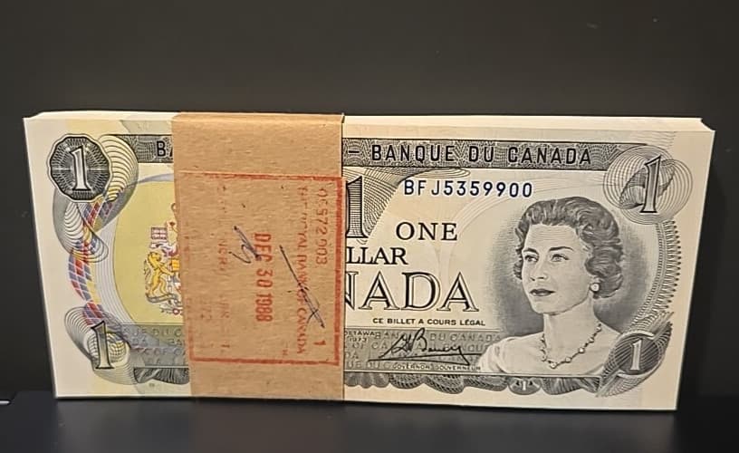 Full Pack of 100 Consecutive 1973 Canadian $1 Uncirculated Notes — view 1